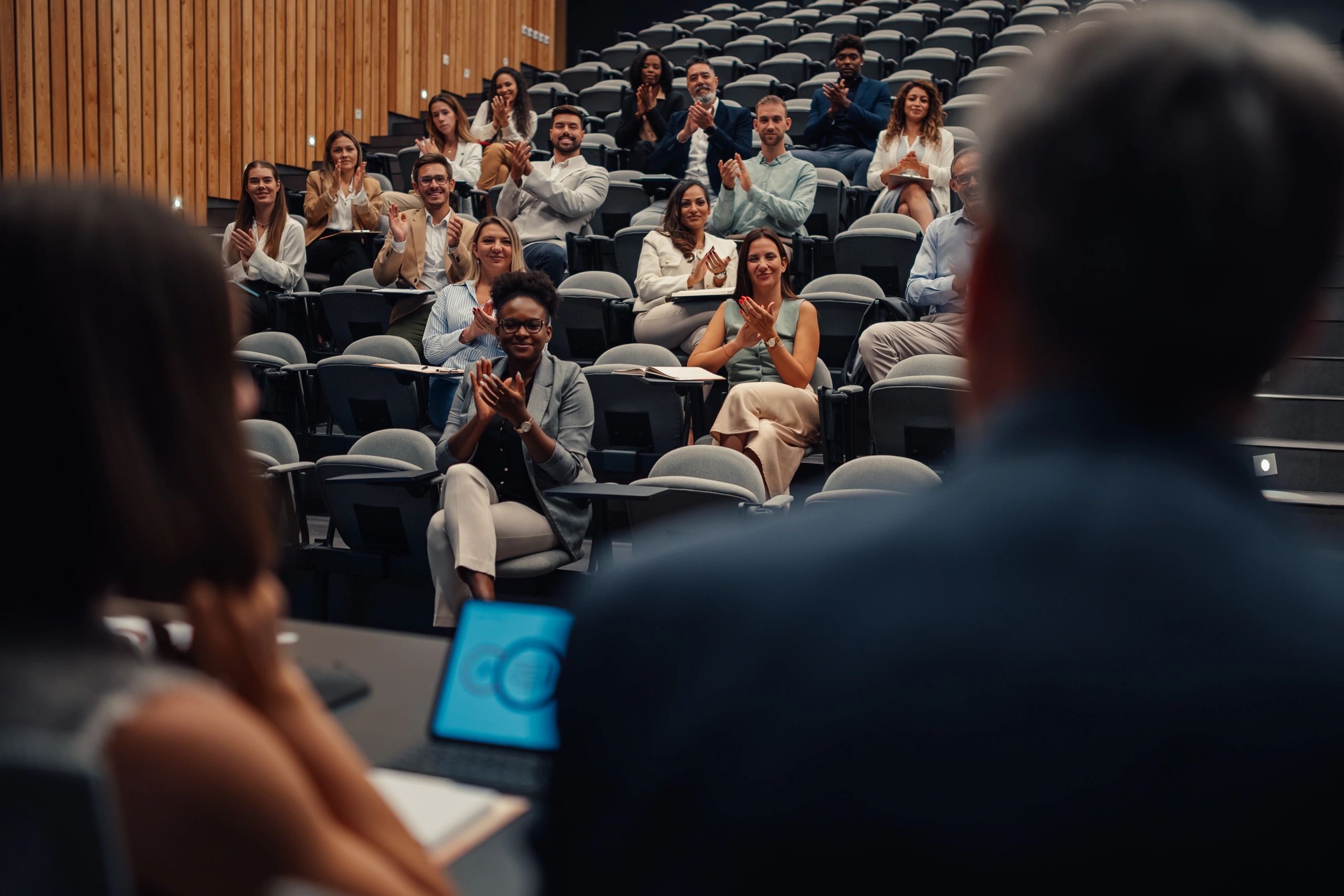 Audience applauding during a leadership presentation