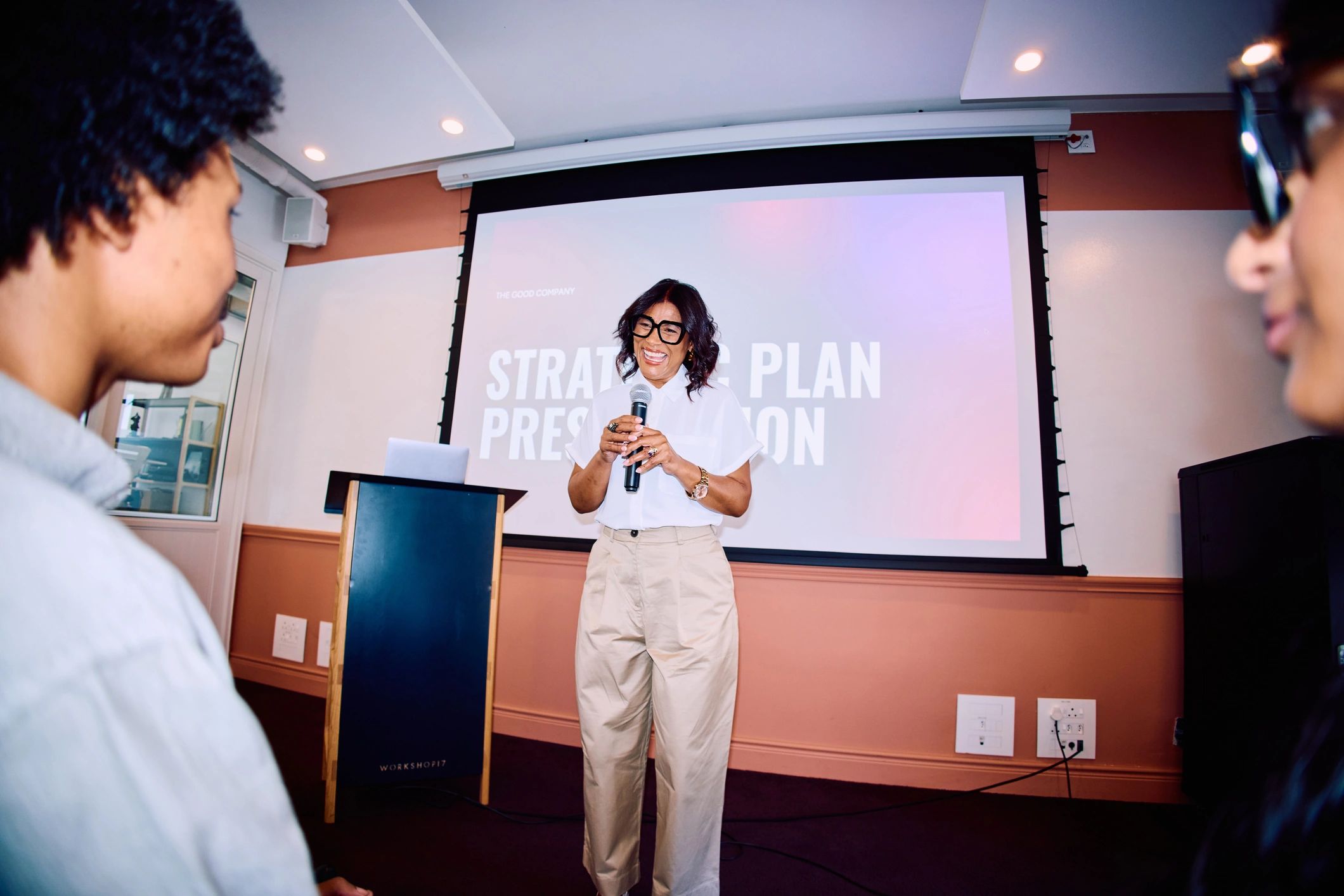 Presenter speaking at a conference